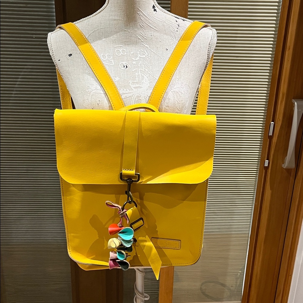 Yellow leather Polo Hut backpack